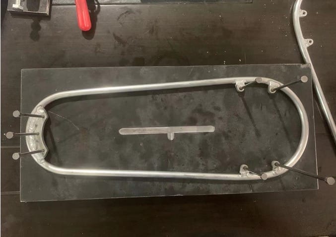 Aluminum frame fabrication fixture during welding and production